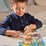 child doing puzzle